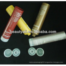 Round colored cosmetic packaging tube for sunblock lotion